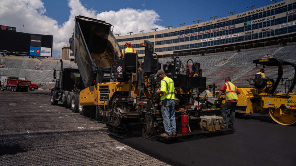 P+D Asphalt Paving Crew Paving the South End Zone of Camp Randall - Madison