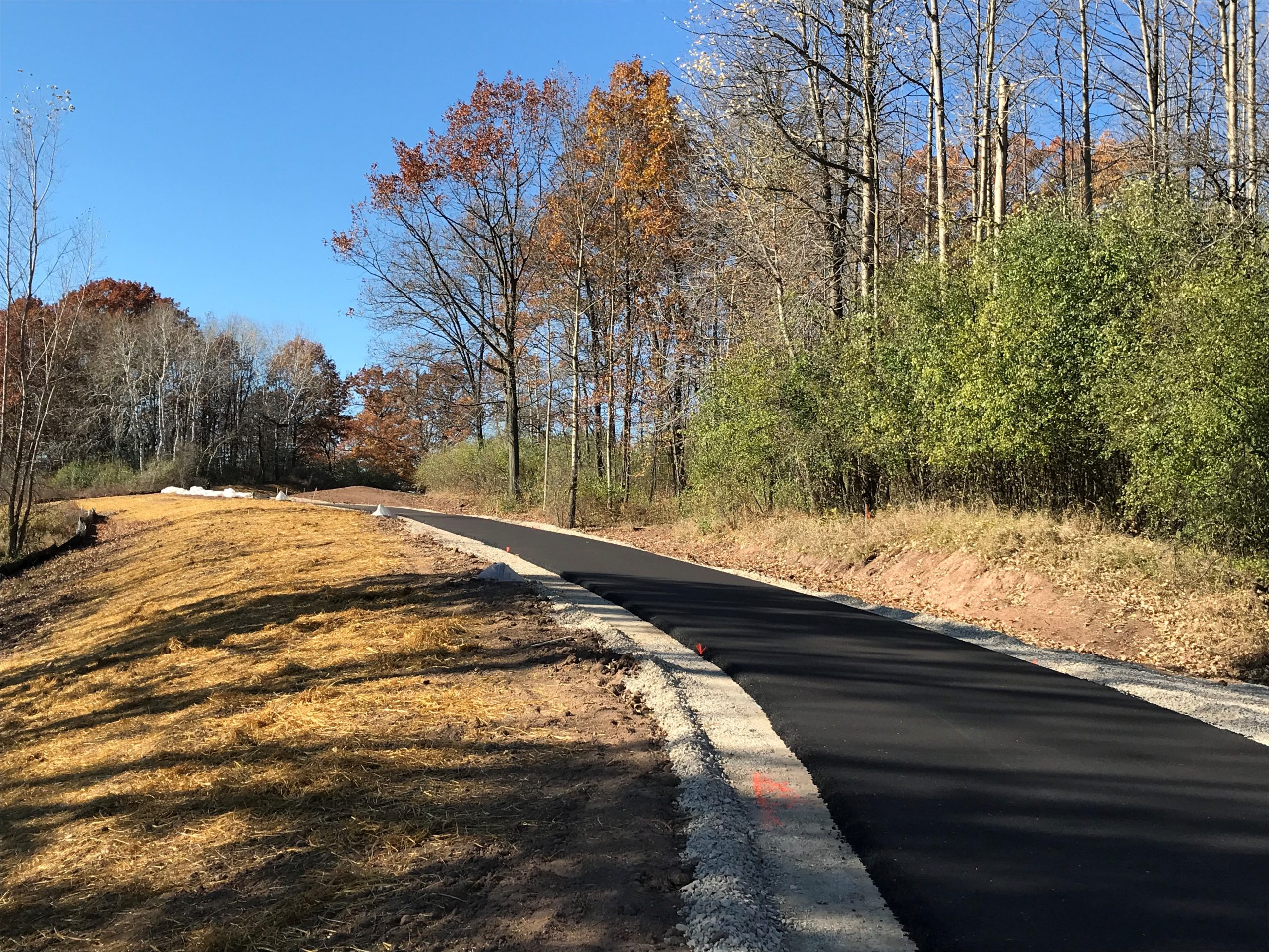 Wide shot view of finished asphalt application State Road 85