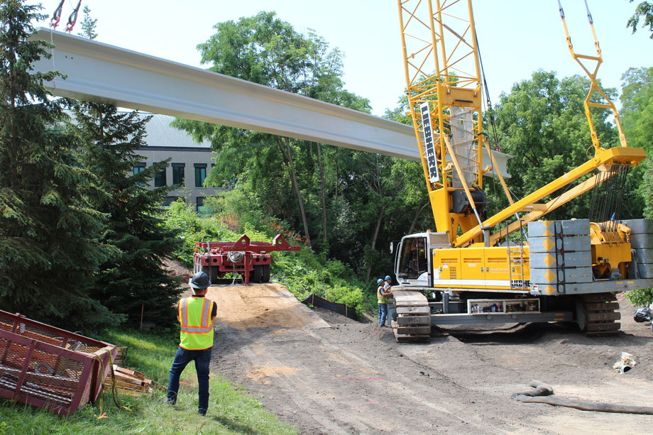 Crane moving construction beams at Lawrence University