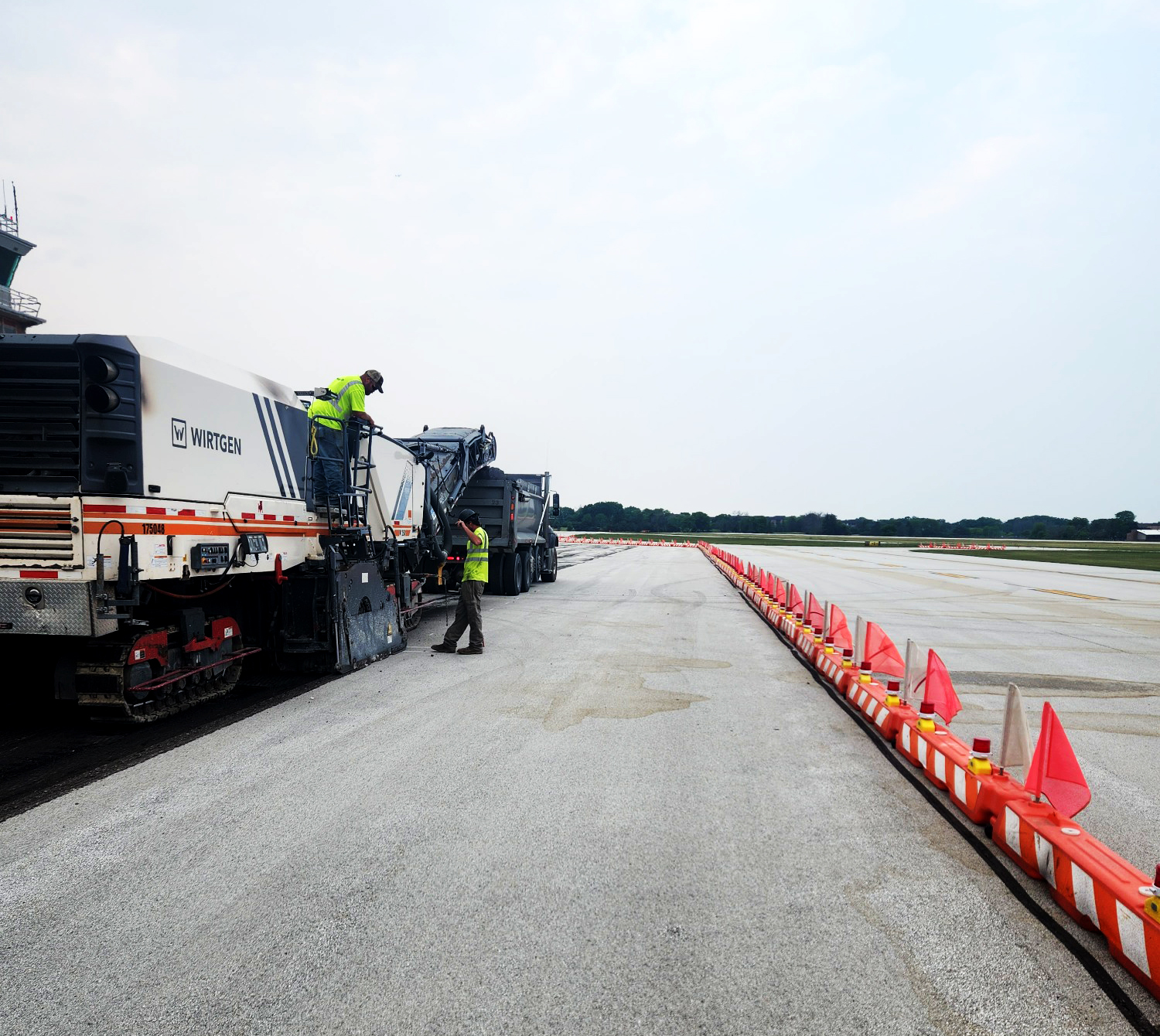 Asphalt pouring and leveling of Milwaukee County Timmerman Airport