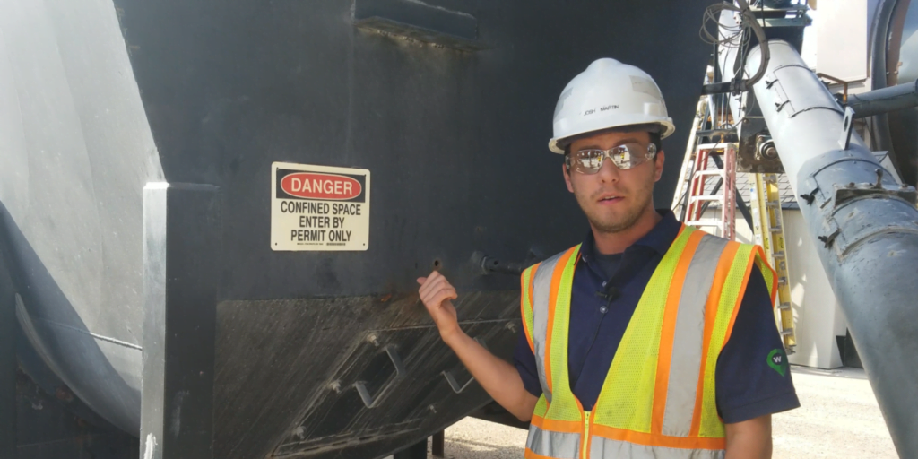 man pointing to confined space