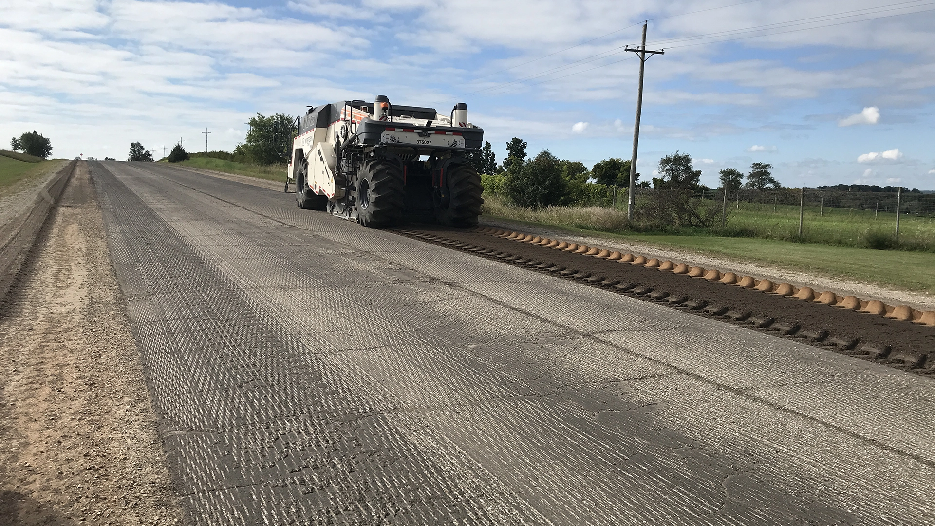 large equipment paving road