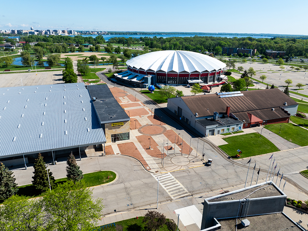 Aerial view looking directly at the Aliant Energy Center showcasing the pavement before project commencing